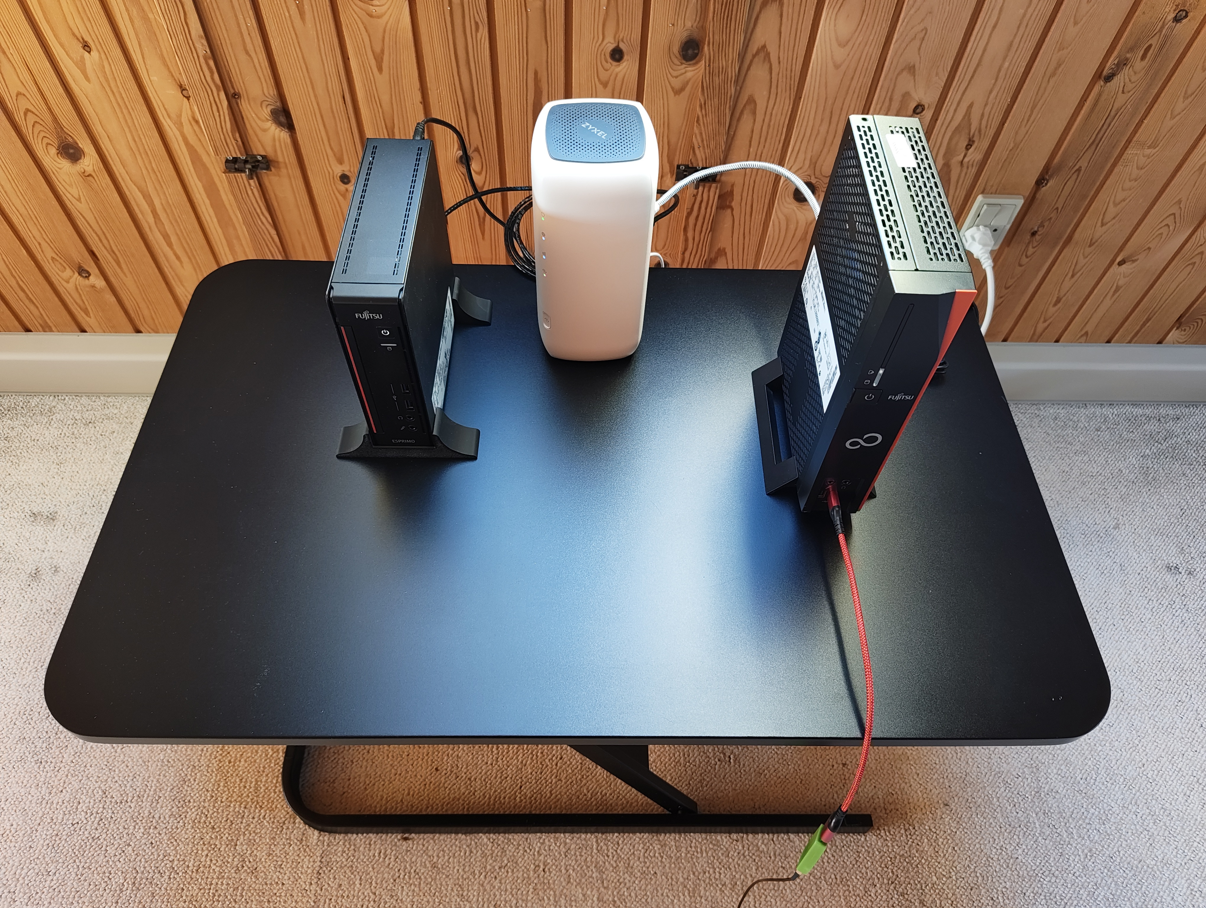 Behold my frugal self-hosted stack! A Fujitsu Futro S920 (right) acts as an ADS-B station and serves TERMINAL-1090 (https://codeberg.org/dmpop/terminal-1090). A Fujitsu Esprimo Q556/2 (left) runs self-hosted applications:

- buen8.tavuk.xyz (microblog)  
- readeck.tavuk.xyz (Readeck Read-It-Later application)

All the hardware, with RAM and storage upgrades, cost me no more than ~€200 (maybe even less -- I'm too lazy to do the math).

Both machines are hooked up to a 5G router on the 3 network. The speed varies wildly, and the connection itself can be unreliable. But the low price is the overriding factor here. It costs ~€15/month, which is probably the cheapest plan on the market.

Next major project: Move my entire digiKam photo library to the Fujitsu Esprimo Q556/2 and serve it using digiKampanion (https://dmpop.codeberg.page/digikampanion/).